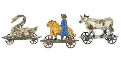 Lot 87 - Group of Three Small Tin Toys Lot of three tin...