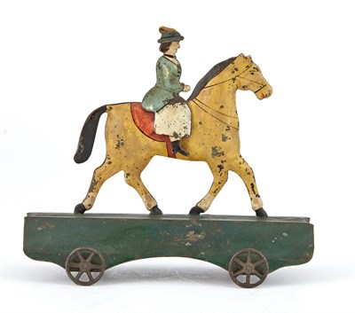Lot 60 - Two Mounted Tin Riders Two small size horse...