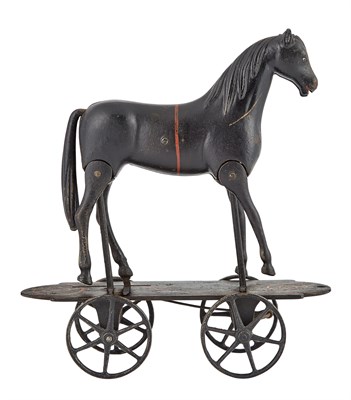 Lot 61 - Horse on Four-Wheeled Platform Cast iron horse...