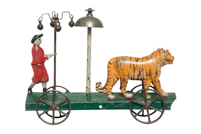 Lot 93 - Tin Toy of Trainer and Two Tigers on Mobile...