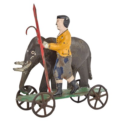 Lot 77 - Elephant and Handler with Bullhook Tin Toy...