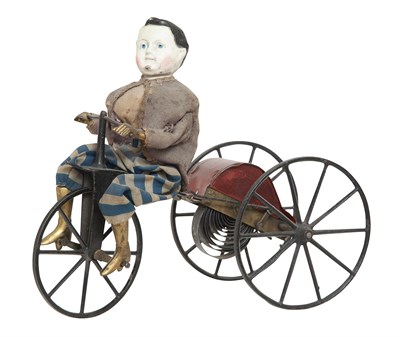 Lot 144 - Clockwork Bicycle and Composition Figure...