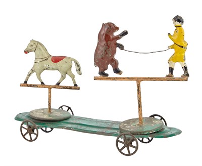 Lot 80 - Dual Action Tin Circus Animal Toy Four wheeled...