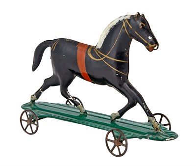 Lot 73 - Black Horse on Platform Tin Toy Georg Brown...