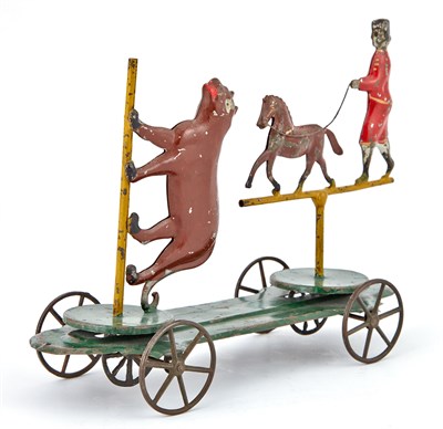 Lot 81 - Dual Action Tin Animal Circus Toy Four wheeled...