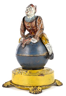 Lot 10 - Clown on Globe Cast Iron Mechanical Bank J & E...