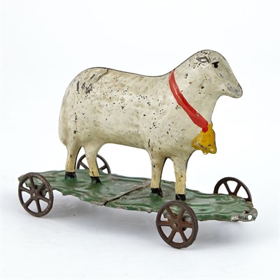 Lot 86 - Two Animal Tin Toys A goat with red saddle...