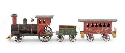 Lot 132 - Painted Tin and Cast Iron Floor Train Possibly...