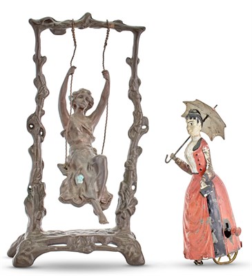 Lot 1406 - Painted Tin Mechanical Figure of a Woman with...