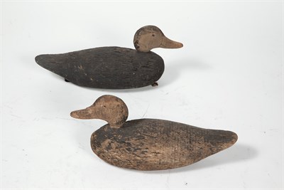 Lot 212 - TWO DUCK DECOYS Two carved duck decoys. Length...