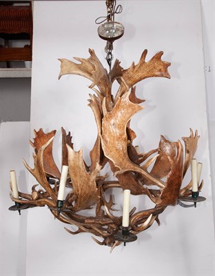 Lot 373 - Eight-Light Antler Chandelier Height 32 inches,...