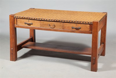 Lot 163 - Arts and Crafts Oak Desk With later embossed...