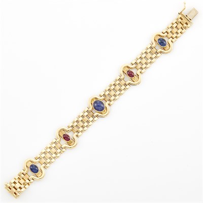 Lot 1616 - Gold, Cabochon Sapphire and Ruby Bracelet