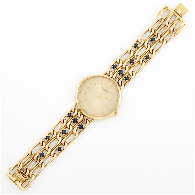 Lot 1743 - Gold and Sapphire Wristwatch