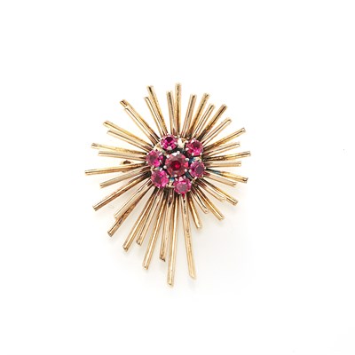 Lot 1047 - Gold and Synthetic Ruby Starburst Brooch