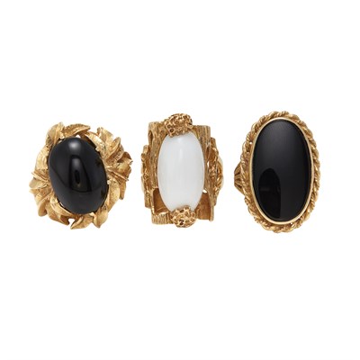 Lot 139 - Three Gold and Black and White Onyx Rings