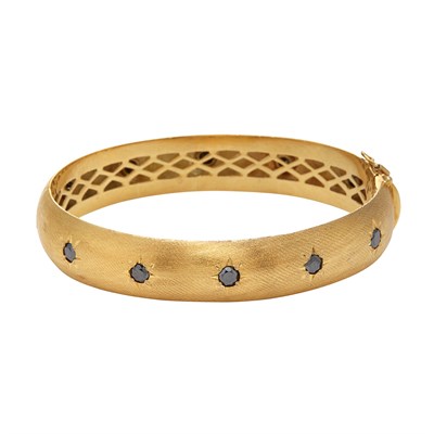 Lot 207 - Gold and Sapphire Bangle Bracelet