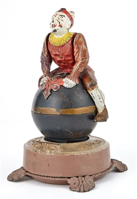 Lot 11 - Clown on Globe Cast Iron Mechanical Bank J & E...