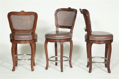 Lot 155 - Three Stained Wood, Caned and Metal Swiveling...