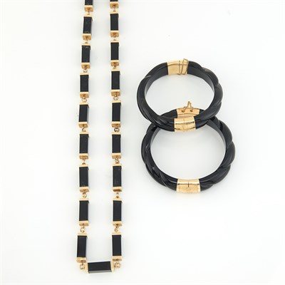 Lot 1496 - Pair of Gold and Black Onyx Bangle Bracelets and Long Black Onyx Chain Necklace