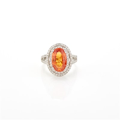 Lot 1284 - White Gold, Orange Sapphire and Diamond Ring