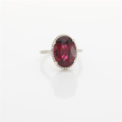 Lot 1068 - White Gold, Almandine Garnet and Diamond Ring