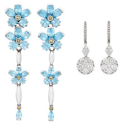Lot 1212 - Pair of White Gold and Diamond Pendant-Earrings and White Gold and Blue Topaz Flower Pendant-Earrings