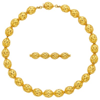 Lot 318 - Gold Bead Necklace and Bar Pin
