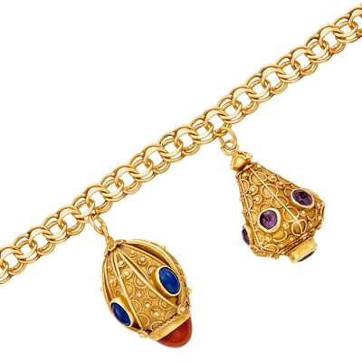 Lot 553 - Gold and Synthetic, Colored Stone and Hardstone Charm Bracelet