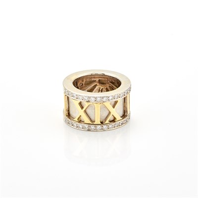 Lot 1248 - Wide Two-Color Gold and Diamond Roman Numeral Band Ring