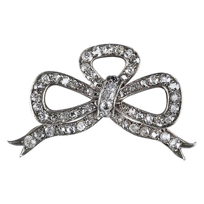 Lot 254 - Antique Silver, Gold and Diamond Bow Pin