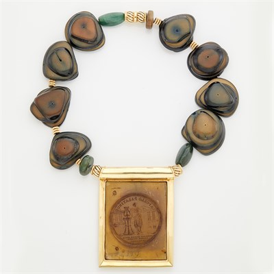Lot 1642 - Seed Bead, Gold and Carved Resin Brooch/Pendant-Necklace