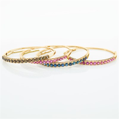 Lot 1782 - Four Gold and Gem-Set Bangle Bracelets