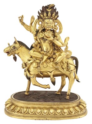 Lot 150 - A Tibetan Gilt Bronze Figure of Mahakala on...