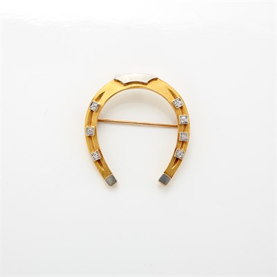 Lot 1041 - Two-Color Gold and Diamond Horseshoe Pin