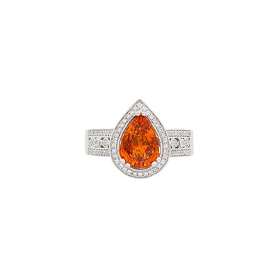 Lot 726 - White Gold, Spessartite Garnet and Diamond Ring