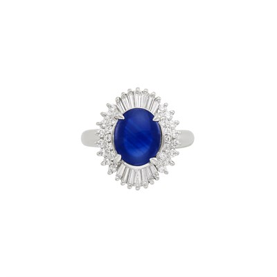 Lot 784 - Platinum, Cabochon Sapphire and Diamond Ring