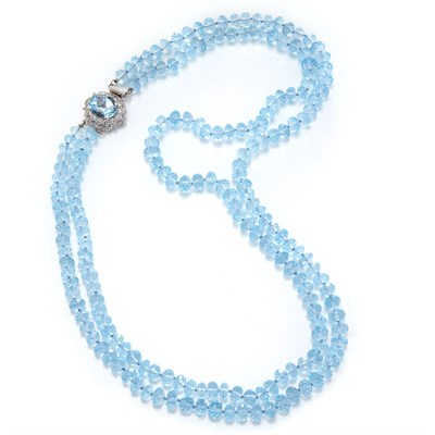 Lot 1077 - Double Strand Blue Topaz Bead Necklace with White Gold, Blue Topaz and Diamond Clasp