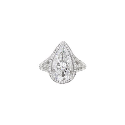 Lot 823 - White Gold and Laser-Drilled Diamond Ring