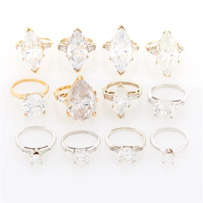Lot 135 - Twelve Two-Color Gold, Platinum and Simulated Diamond Rings