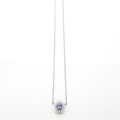 Lot 1285 - White Gold, Sapphire and Diamond Pendant-Necklace, Thomas Cooper