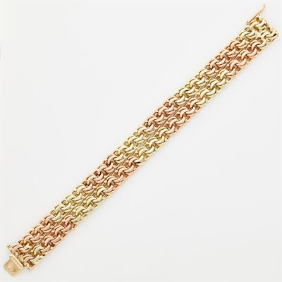 Lot 1254 - Two-Color Gold Double Spiral Link Bracelet