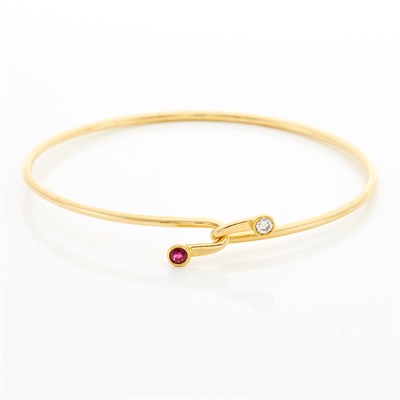 Lot 1198 - Gold, Ruby and Diamond Bangle Bracelet, Tiffany & Co.
