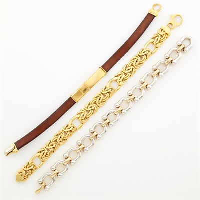 Lot 1144 - Two-Color Gold Link Bracelet, Gold Bracelet and Leather Bracelet