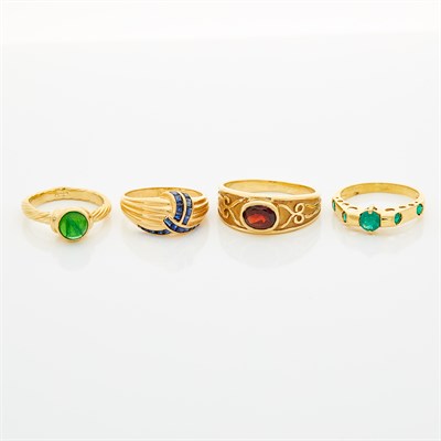 Lot 1574 - Four Gold, Metal, Garnet, Sapphire, Emerald, and Green Glass Rings