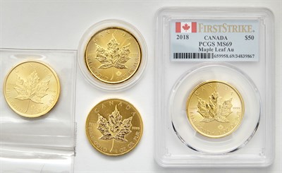 Lot 78 - Canada $50 Maple Group of four coins dated...