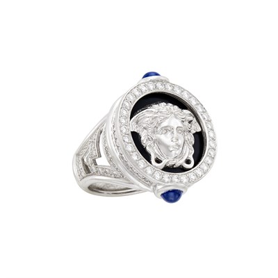 Lot 757 - Gentleman's White Gold, Black Enamel, Diamond and Cabochon Sapphire Medusa Ring, Gianni Versace