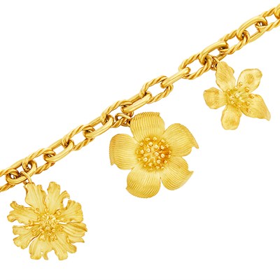 Lot 694 - Gold Flower Charm Bracelet, Tiffany & Co.
