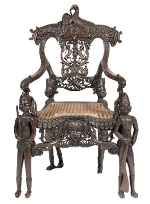 Lot 1136 - Anglo-Indian Hardwood and Caned Armchair...