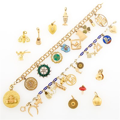 Lot 180 - Two Gold, Low Karat Gold, Silver, Metal and Enamel Charm Bracelets and Nine Loose Charms